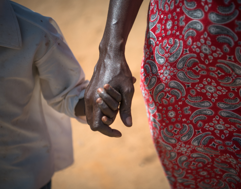 Josephine, 9 years old, walking with her mother Celina in Lodwar, Kenya. (Image credit: Allan Gichigi / Save the Children)