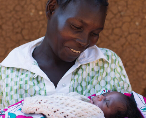 READY Guidance: Maternal and Newborn Health cover image: Trizer, three days old, with her mother Metrine outside their home in Bungoma, Kenya. Image credit: Sarah Waiswa / Save the Children